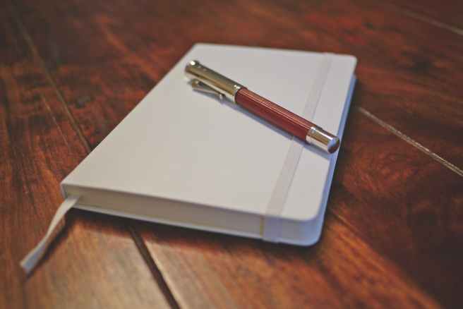 desk empty fountain pen notebook